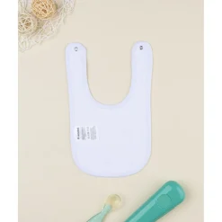 Babero niña con caracoles all over