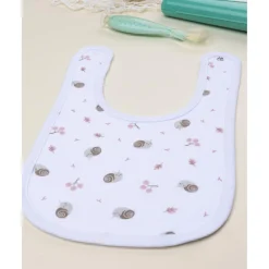 Babero niña con caracoles all over