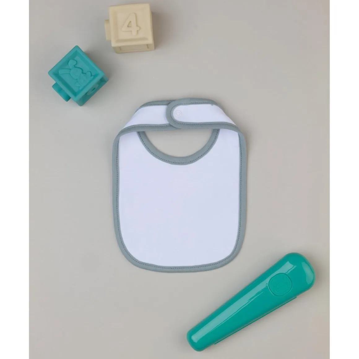 Babero niño blanco/gris