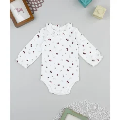 Body blanco de bebé con flores y cuello Peter Pan