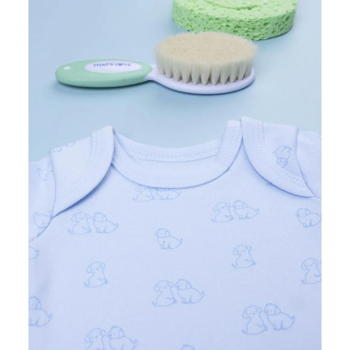 Body de bebé en algodón blanco con estampado de perritos