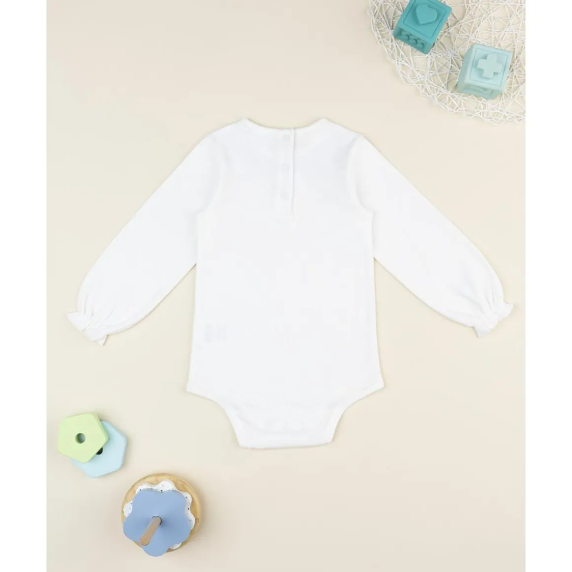 Body de niña blanco con bordado floral