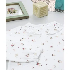 Body de niña blanco con florecitas