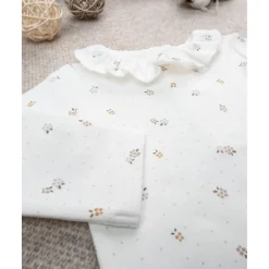 Body niña blanco con estampado allover y cuello