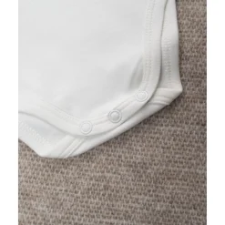 Body niña blanco con estampado de animalitos