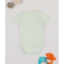 Body niña verde con flores estilizadas