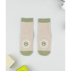 Calcetines antideslizantes niño beige león