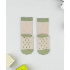 Calcetines antideslizantes niño beige león