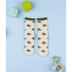Calcetines antideslizantes beige de niño con dinosaurios