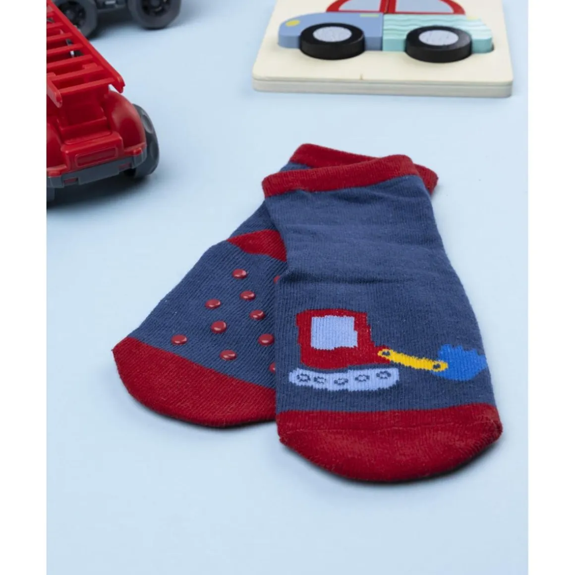 Calcetines antideslizantes niño azul con vehículos