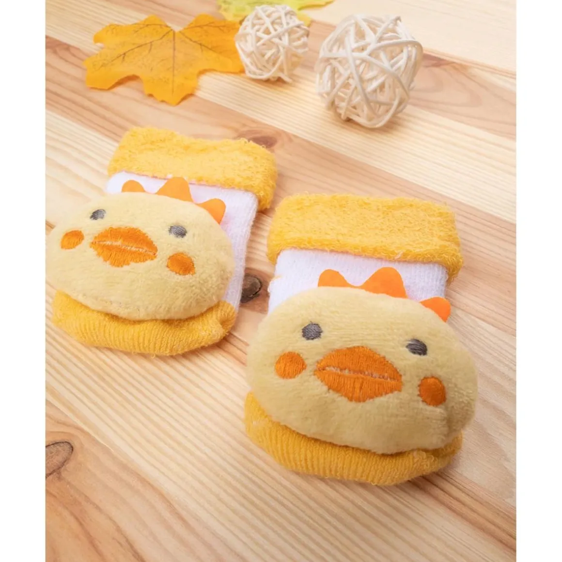 Calcetines unisex con sonajero pollito