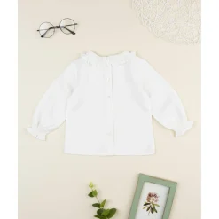 Camisa blanca de niña con volante