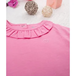 Camiseta de niña rosa con cuello