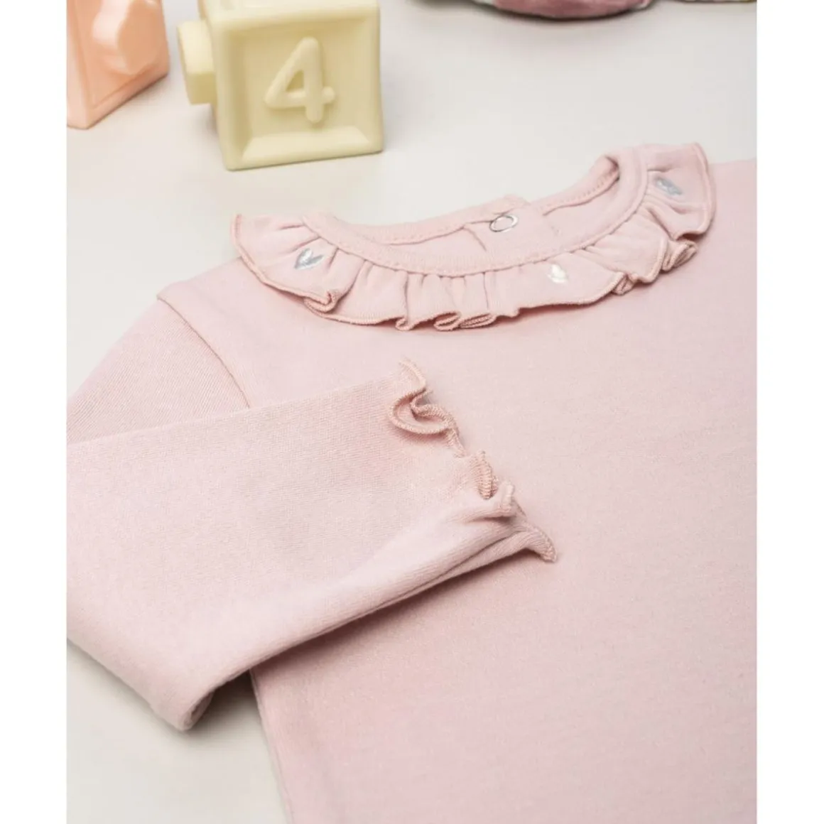 Camiseta niña rosa con volantes