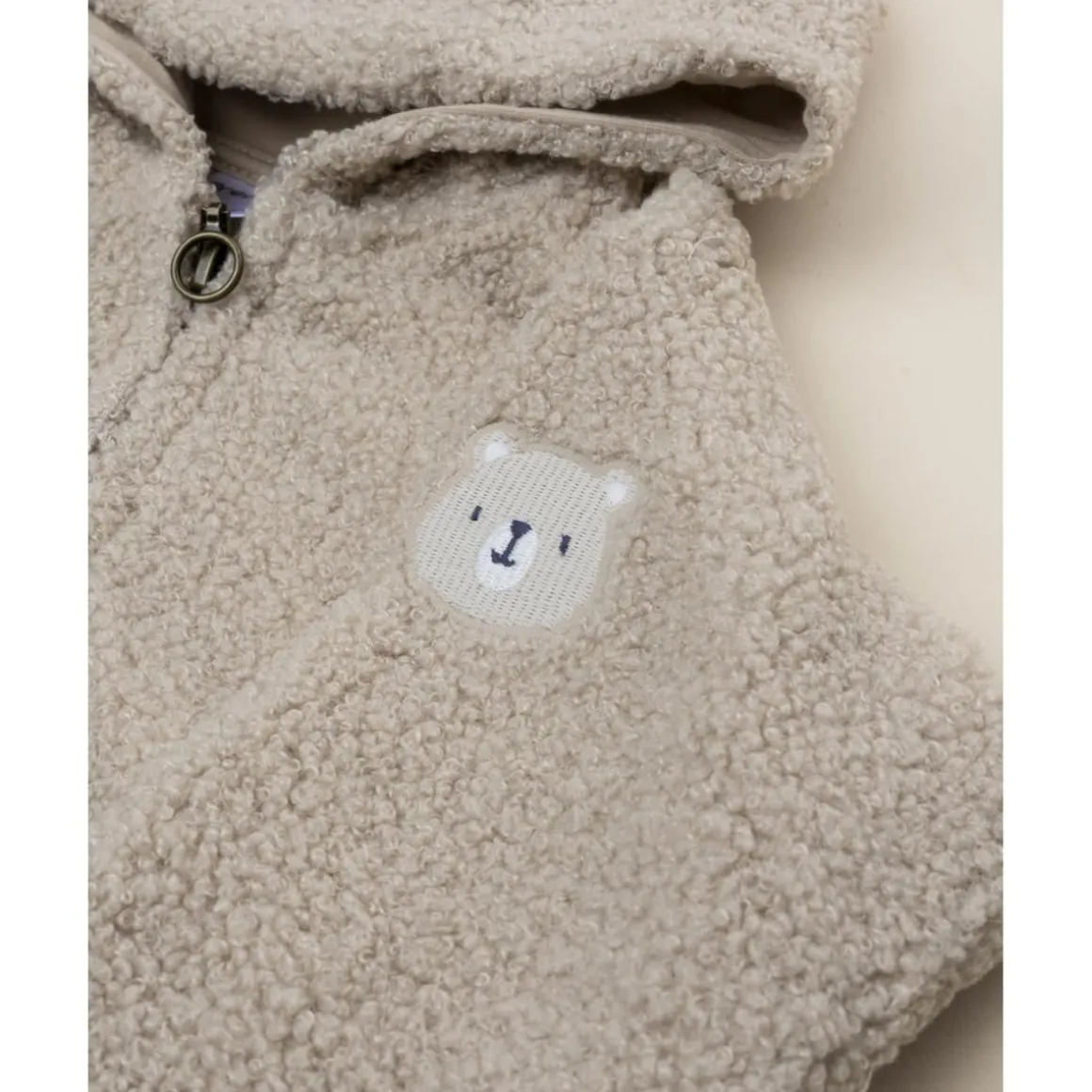 Cardigan bebé beige con capucha efecto peluche
