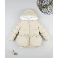 Chaqueta beige con lazos para niña
