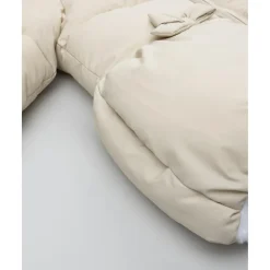 Chaqueta beige con lazos para niña