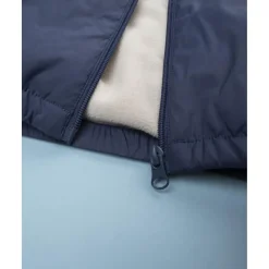 Chaqueta cortavientos azul con forro polar