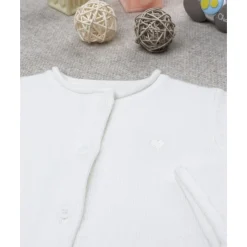 Chaqueta de punto blanca para niña