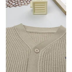 Cárdigan de niño beige de punto tricot
