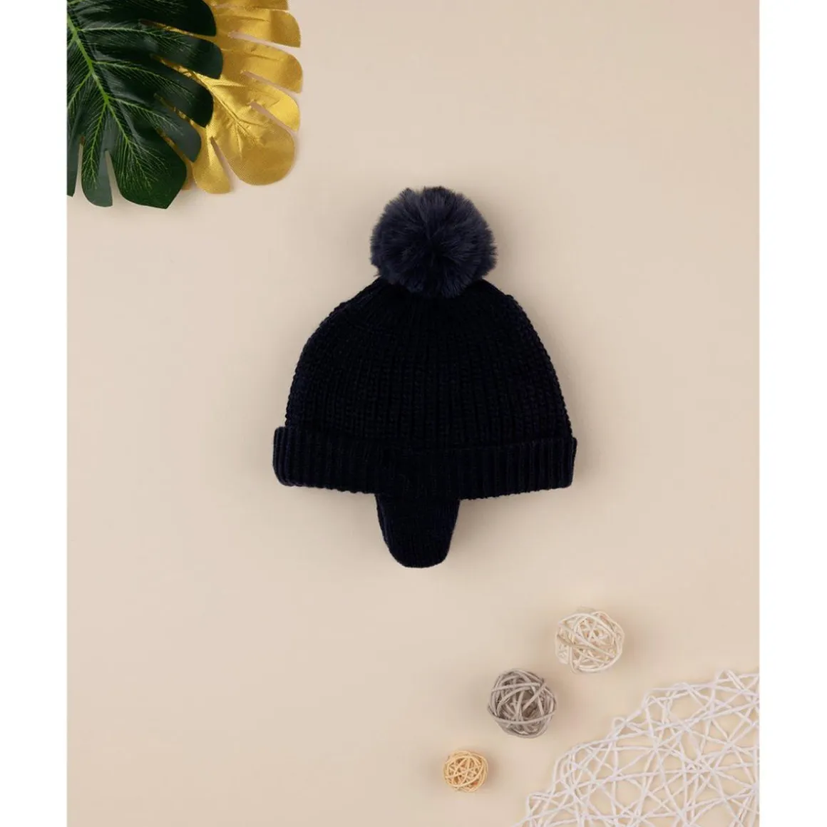 Gorro de lana con pompón de pelo