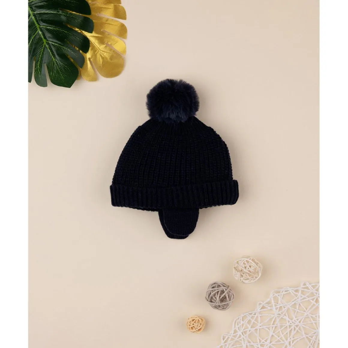 Gorro de lana con pompón de pelo
