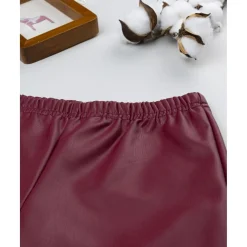 Leggings efecto piel burdeos para niña