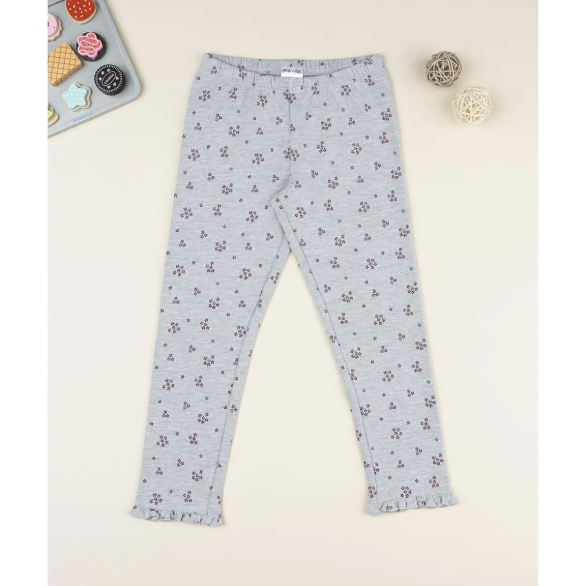 Leggings grises de niña con estampado floral allover