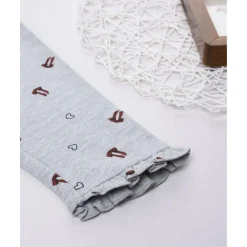 Leggings niña grises con corazones y lazos