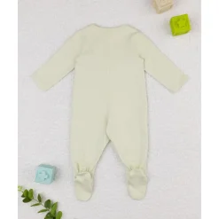 Mameluco verde con flores estilizadas