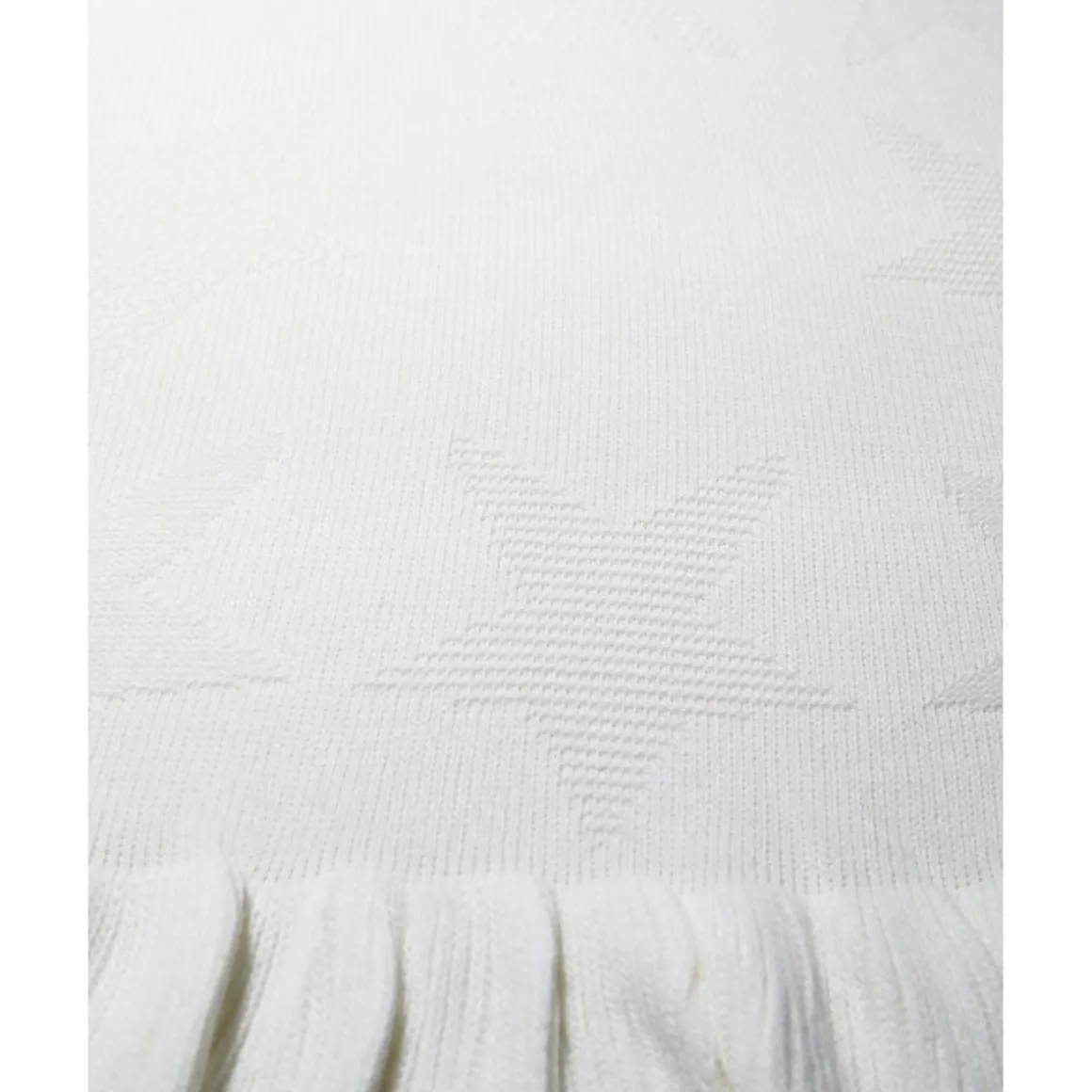 Manta con volantes y bordado de estrellas