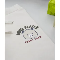 Pantalón beige con estampado para niño