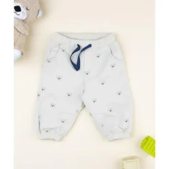 Pantalón beige de niño con estampado allover de ositos