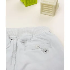 Pantalón beige de niño con estampado allover de ositos