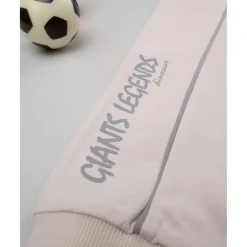 Pantalones niño beige dinosaurios