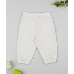 Pantalones niño beige estampado relieve