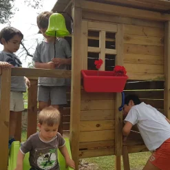 Parque juegos infantil de madera Taga con pared de escalada