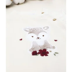 Pelele de terciopelo crema con ciervita para recién nacida