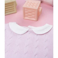 Pelele tricot rosa de niña con lazo
