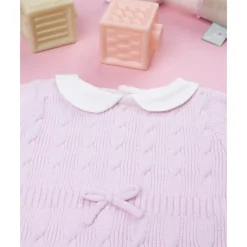 Pelele tricot rosa de niña con lazo