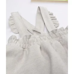 Peto con falda niña beige con bordados