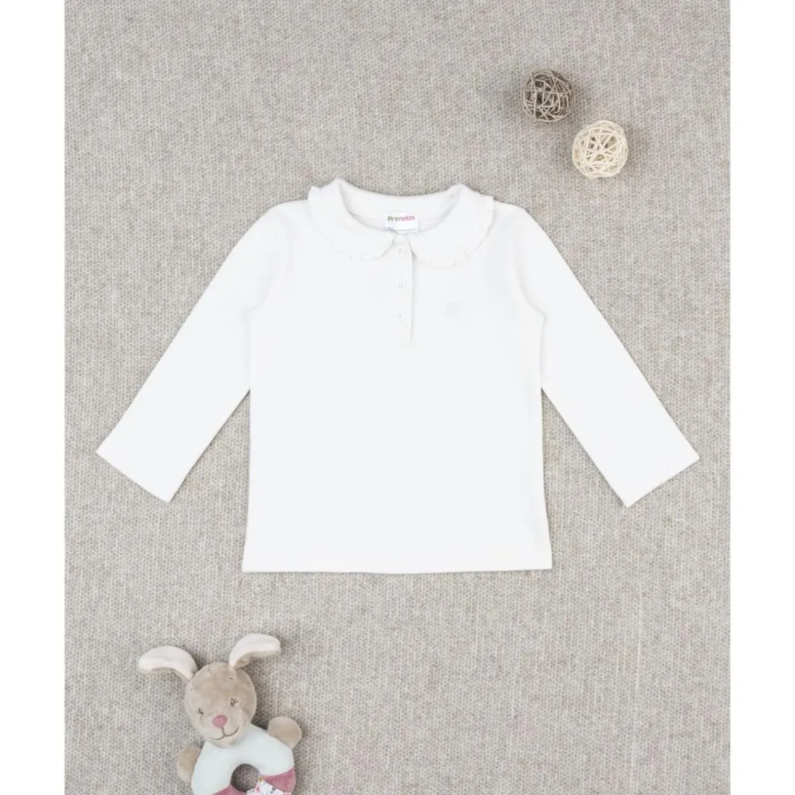 Polo blanco de niña de manga larga