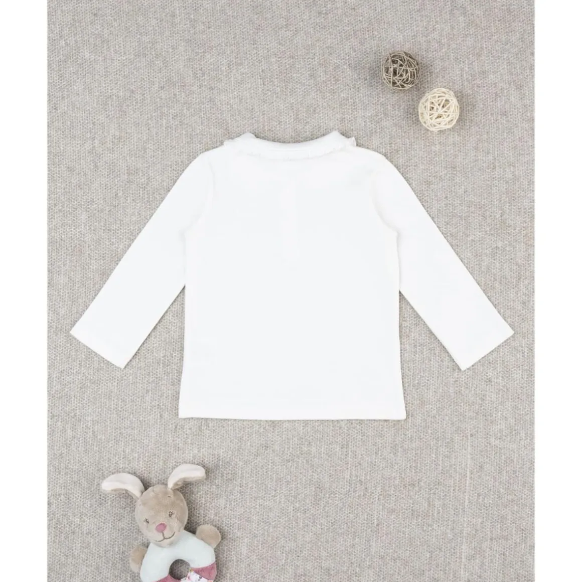 Polo blanco de niña de manga larga