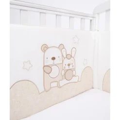Protector de cuna con detalles en beige